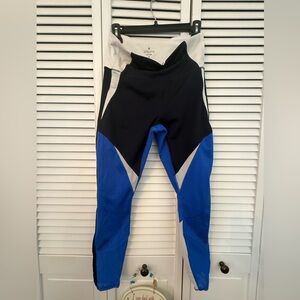 Athleta High Rise Precision 7/8 tights in black, blue, and white color